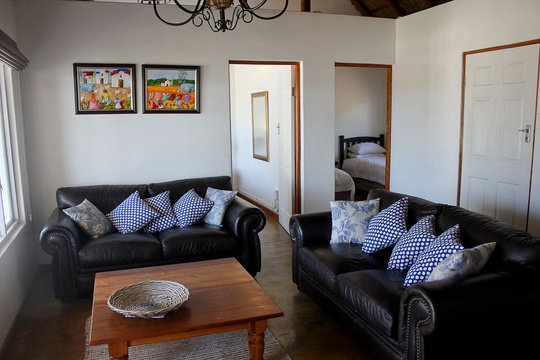 Krefie - the livingroom has full view of the lagoon and white sandy beach and are perfect to just relax!